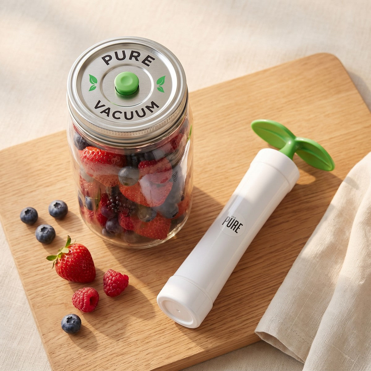 A PURE valved lid on a jar of berries with the MVP pump beside it