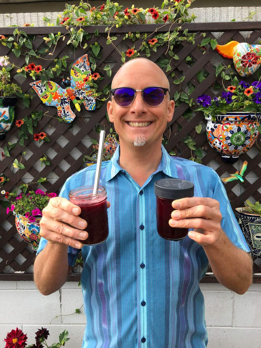 Conrad Freese holding a jar of juice